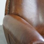 Karaktervolle En Tijdloze Rundleren Design Fauteuil/ Armchair Met Mooie Ronde Vormen En Siernagel thumbnail 12