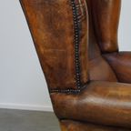 Comfortabele Schapenleren Oorfauteuil Met Een Prachtige Vintage Uitstraling thumbnail 11