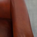 Stijlvolle En Elegante Clubfauteuil Gemaakt Van Rundleer Met Een Luxe Afwerking Met Siernagels thumbnail 7