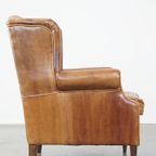 Sierlijke, Stijlvolle, Tijdloze En Comfortabele Oorfauteuil Gemaakt Van Rundleer In Engelse Stijl thumbnail 4