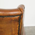 Stoere Schapenleren Oorfauteuil Met Vast Zitkussen En Mooie Warme Cognac Kleuren thumbnail 13