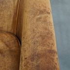 Positief Doorleefde Schapenleren Clubfauteuil Met Een Stoere En Sleetse Vintage Uitstraling thumbnail 8
