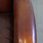 Karkatervolle Vintage Schapenleren Armchair/ Fauteuil Met Warme Kleuren En Een Mooi Patina thumbnail 9