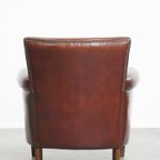 Vintage Karaktervolle Fauteuil Gemaakt Van Schapenleer Met Een Prachtige Warme Kleurstelling thumbnail 5