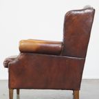 Comfortabele, Elegante, Statige Oorfauteuil Gemaakt Van Schapenleer In Een Mooie Warme Kleur thumbnail 6