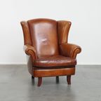 Sierlijke En Ruime Schapenleren Oorfauteuil Met Warme Kleuren thumbnail 10