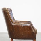 Statige En Comfortabele Generfde Rundleren Armchair Met Een Tijdloos Design En Een Mooie Kleur thumbnail 12
