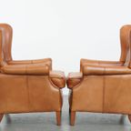 Klassieke En Unieke Set Van 2 Rundleren Oorfauteuils Afgewerkt Met Siernagels En Mooie Details thumbnail 3