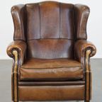 Comfortabele Vintage Schapenleren Oorfauteuil Met Een Tijdloos Design En Een Strakke Afwerking thumbnail 3