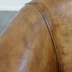 Tijdloze En Stijlvolle Schapenleren Clubfauteuil Met Prachtige Kleuren En Goed Zitcomfort thumbnail 13