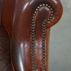 Stoere Maar Comfortabele Clubfauteuil Gemaakt Van Schapenleer En Afgewerkt Met Siernagels thumbnail 10