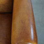 Luxe, Tijdloze Schapenleren Set Bestaande Uit 2 Fauteuils En Een Hocker In Art Deco Stijl thumbnail 22