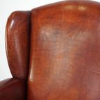 Klassieke Vintage Schapenleren Oorfauteuil Met Mooie Afwerking En Warme Kleuren thumbnail 14