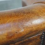 Subtiele, Cognac-kleurige Schapenleren Clubfauteuil Met Een Tijdloos Design En Correct Afgewerkt thumbnail 14