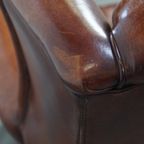 Grote Karaktervolle En Tijdloze Schapenleren Oorfauteuil Met Een Luxe Afwerking thumbnail 8