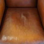 Luxe Cognac-kleurige Schapenleren Armchair Met Ronde Vormen En Een Uniek Design thumbnail 7