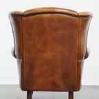 Sierlijke En Ruime Schapenleren Oorfauteuil Met Warme Kleuren thumbnail 2