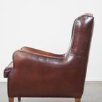 Prachtig Gekleurde, Stoere Vintage Schapenleren Fauteuil Met Een Hoge Rug En Afgewerkt Met Zwarte thumbnail 8