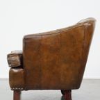 Stijlvolle Fauteuil Gemaakt Van Rundleer Met Een Unieke Vormgeving En Een Prachtige Afwerking thumbnail 6