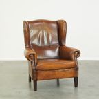 Stoere Schapenleren Oorfauteuil Met Vast Zitkussen En Mooie Warme Cognac Kleuren thumbnail 2