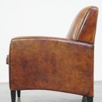 Comfortabele Vintage Schapenleren Design Armchair Met Een Stoere Look thumbnail 6