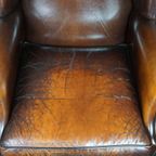 Luxe Grote Schapenleren Oorfauteuil Met Prachtige Kleuren En Geweldig Patina thumbnail 7