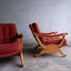 Pair Of Red Fabric And Wooden Club Chairs With Soft Lined Design. thumbnail 8