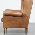 Charmante, Tijdloze En Karaktervolle Rundleren Oorfauteuil In Een Lichte Cognac Kleur thumbnail 3