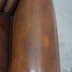 Subtiele, Prachtig Gekleurde Schapenleren Fauteuil Met Een Uniek Design Afgewerkt Met Siernagels thumbnail 9