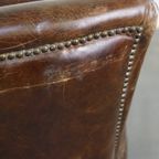 Statige En Comfortabele Generfde Rundleren Armchair Met Een Tijdloos Design En Een Mooie Kleur thumbnail 15