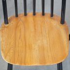 Set Van 4 Vintage Houten Design Stoelen Met Zwarte Spijlen Rugleuning En Bruine Zitting thumbnail 8