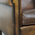 Subtiele, Stoere, Donkere En Strak Afgewerkte Schapenleren Fauteuil/armchair Met Veel Karakter thumbnail 11