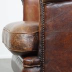 Stoere, Karaktervolle En Comfortabele Cognac-Kleurige Schapenleren Clubfauteuil Met Een Tijdloos thumbnail 13