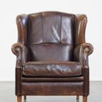 Comfortabele En Stoere Oorfauteuil Gemaakt Van Schapenleer En Strak Afgewerkt Met Zwarte Biezen thumbnail 3