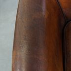 Cognac-kleurige En Comfortabele Vintage Schapenleren Clubfauteuil Met Een Royale Zit thumbnail 17
