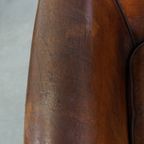 Cognac-Kleurige En Comfortabele Vintage Schapenleren Clubfauteuil Met Een Royale Zit thumbnail 8