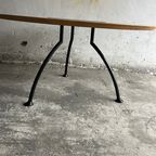 Round Dining Table With Rotating Black Center Disc thumbnail 6