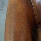 Cognac-kleurige, Karakteristieke Vintage Schapenleren Clubfauteuil Met Een Tijdloos Design thumbnail 10