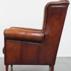 Grote Karaktervolle En Tijdloze Schapenleren Oorfauteuil Met Een Luxe Afwerking thumbnail 14