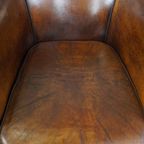 Cognac-kleurige En Comfortabele Vintage Schapenleren Clubfauteuil Met Een Royale Zit thumbnail 14