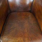 Cognac-Kleurige En Comfortabele Vintage Schapenleren Clubfauteuil Met Een Royale Zit thumbnail 7