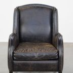 Stoere, Karaktervolle Zwarte Rundleren Fauteuil In Industriële Stijl Met Een Hoge Rug thumbnail 6
