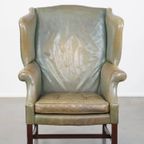 Unieke En Karaktervolle Groene Rundleren Oorfauteuil Met Een Mooi Patina En Correct Afgewerkt thumbnail 7