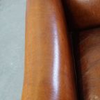 Zeer Mooie Schapenleren Fauteuil Met Een Luxe Vormgeving En Hout Gesneden Poten thumbnail 8