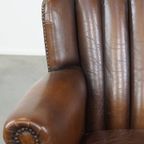 Subtiele, Prachtig Gekleurde Schapenleren Fauteuil Met Een Uniek Design Afgewerkt Met Siernagels thumbnail 10