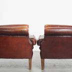 Karaktervolle Set Van 2 Vintage Schapenleren Armchairs Met Warme Kleuren En Een Mooi Patina thumbnail 3