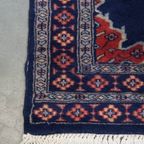 Subtiel Vloerkleed Met Voornamelijk Donkerblauw Gemaakt Van Wol 139x66cm thumbnail 8