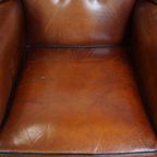 Grote En Luxe Schapenleren Oorfauteuil Met Een Prachtige Warme Kleurstelling thumbnail 6