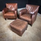 Set Van 2 Vintage Leren Fauteuils Met 1 Poef thumbnail 2