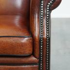 Grote En Luxe Schapenleren Oorfauteuil Met Een Prachtige Warme Kleurstelling thumbnail 9